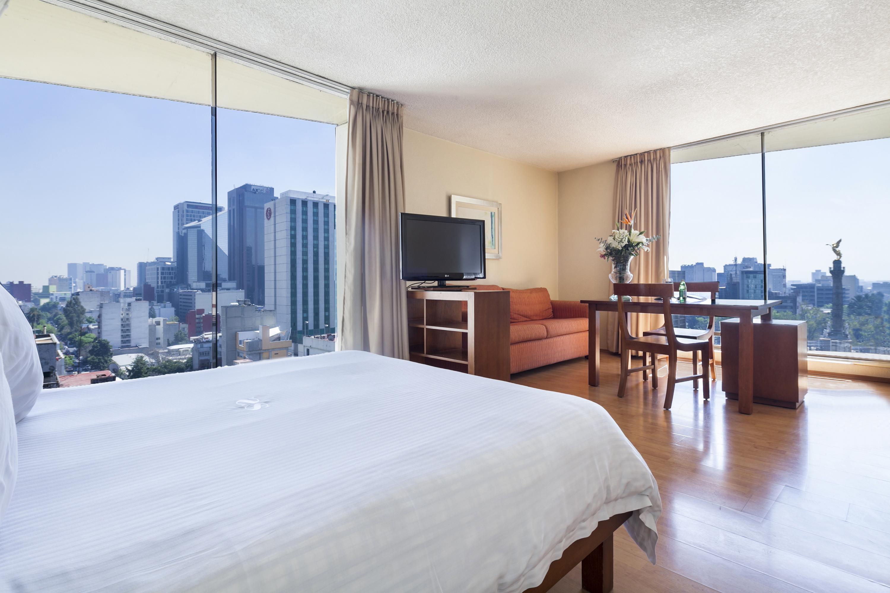 الشقق الفندقية مدينة مكسيكوفي  إكس سويتس سان مارينو المظهر الخارجي الصورة A room at the hotel